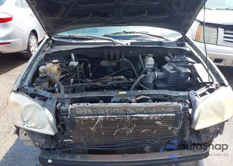 2006 Mazda Tribute I из США, поврежденный, VIN 4F2YZ02Z96KM36394